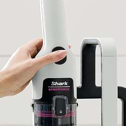 Close-up of a Shark StainForce product image with a circular hotspot overlay indicating a feature or a callout