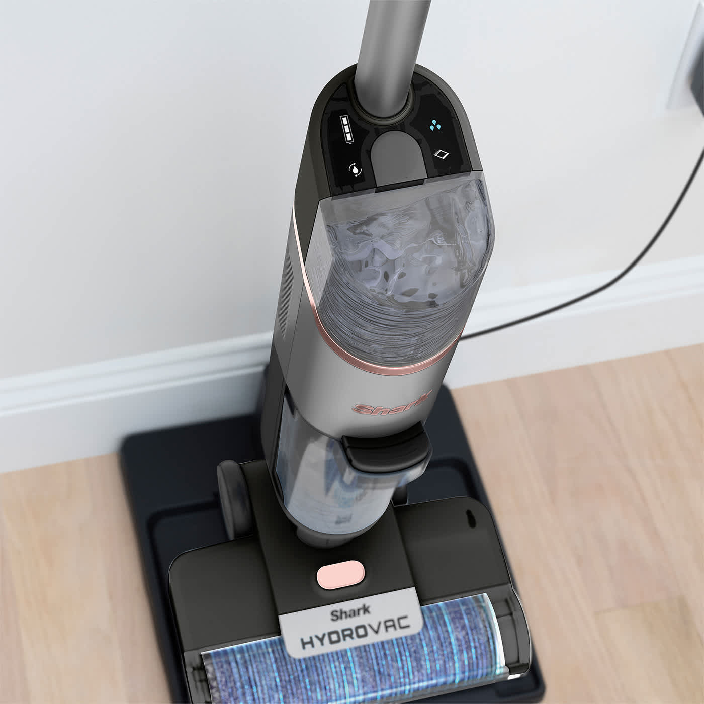 Vacuums, mops & cleans itself at the same time