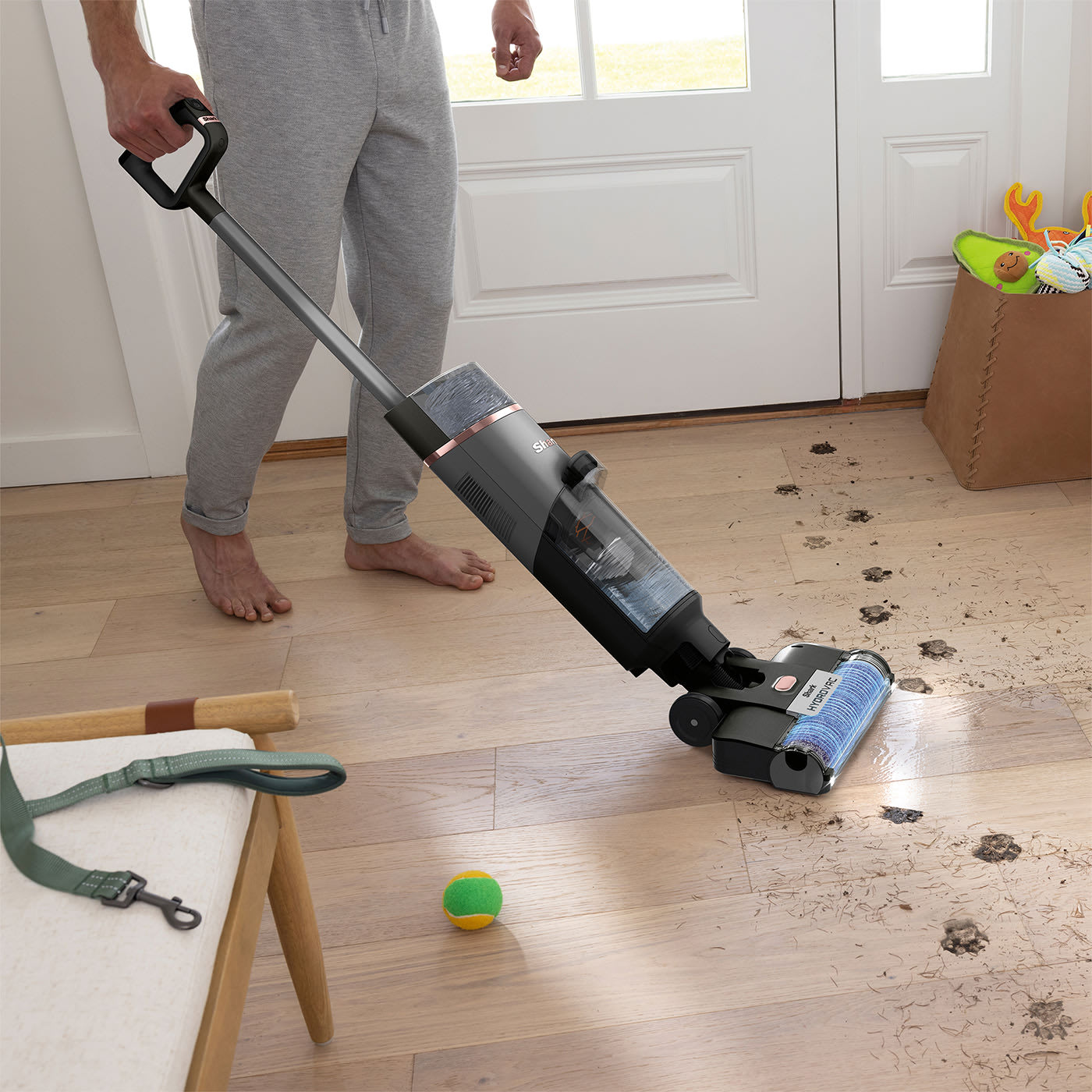 Vacuums, mops & cleans itself